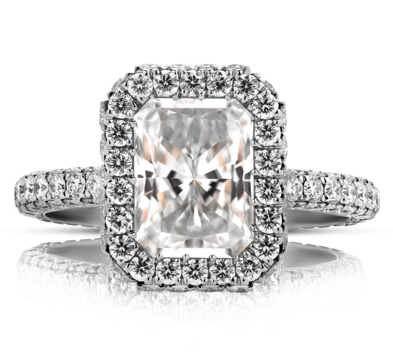 Bespoke halo engagement ring by M.C. Jeweller Originals