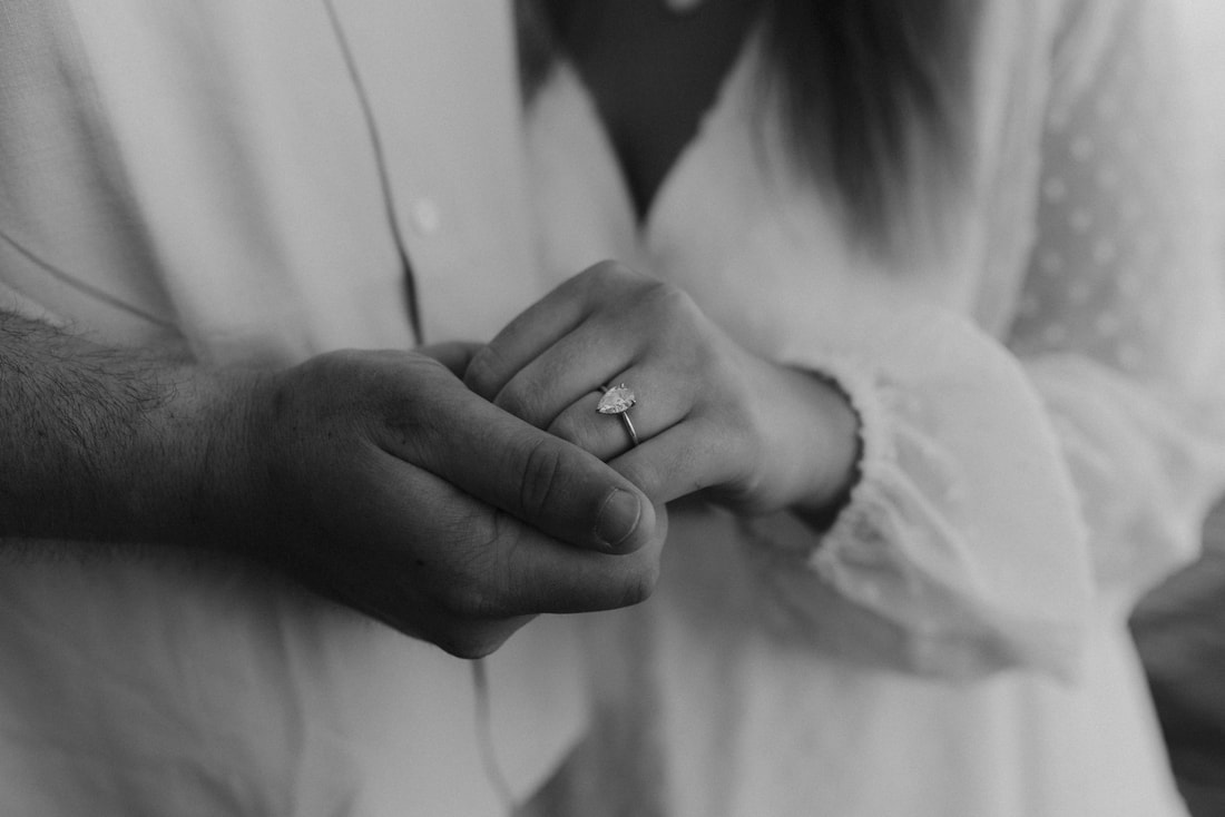 Custom engagement ring on hand — client piece by Maxime Carrière